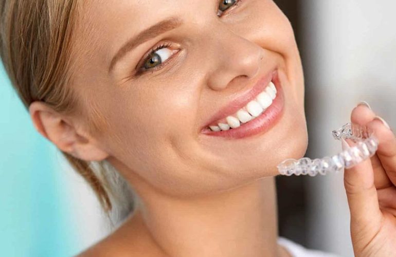 woman happy for her invisalign braces