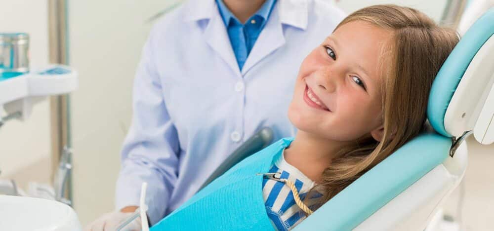 Girl happy in dentistry